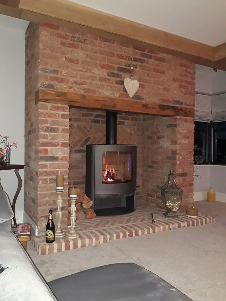 Termatech TT22 stove in brick fireplace
